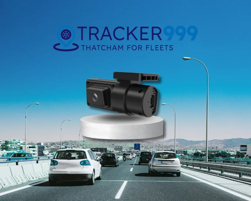 Dual dash cam displayed above busy motorway with Wholesale Telematics logo and Thatcham approval message